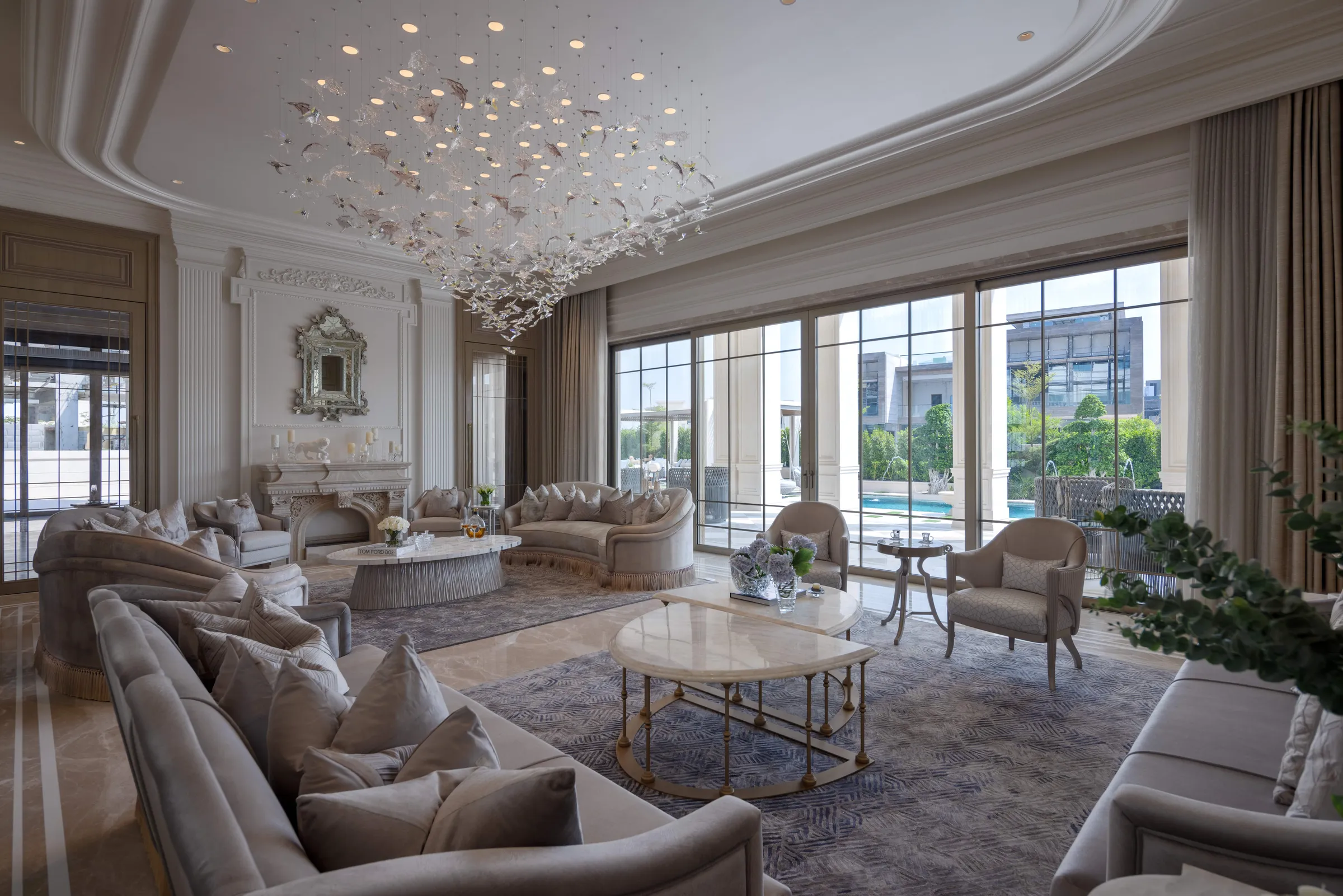Grand luxury residence with a sculptural chandelier and marble furnishings